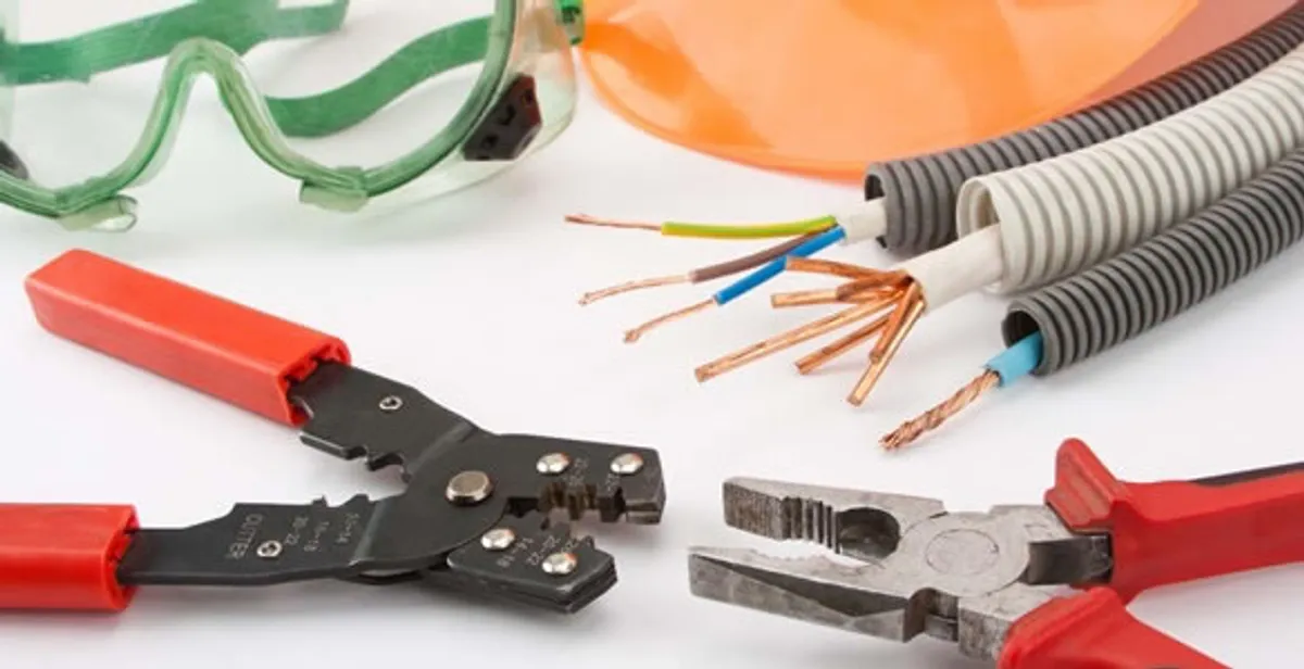 Electrical wiring repair with professional tools and safety equipment in Hutchins, TX