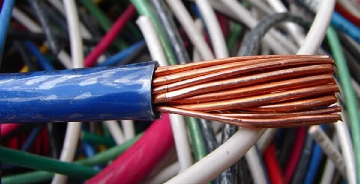 electrical wiring services showing exposed copper conductors and cable preparation in Dallas, TX
