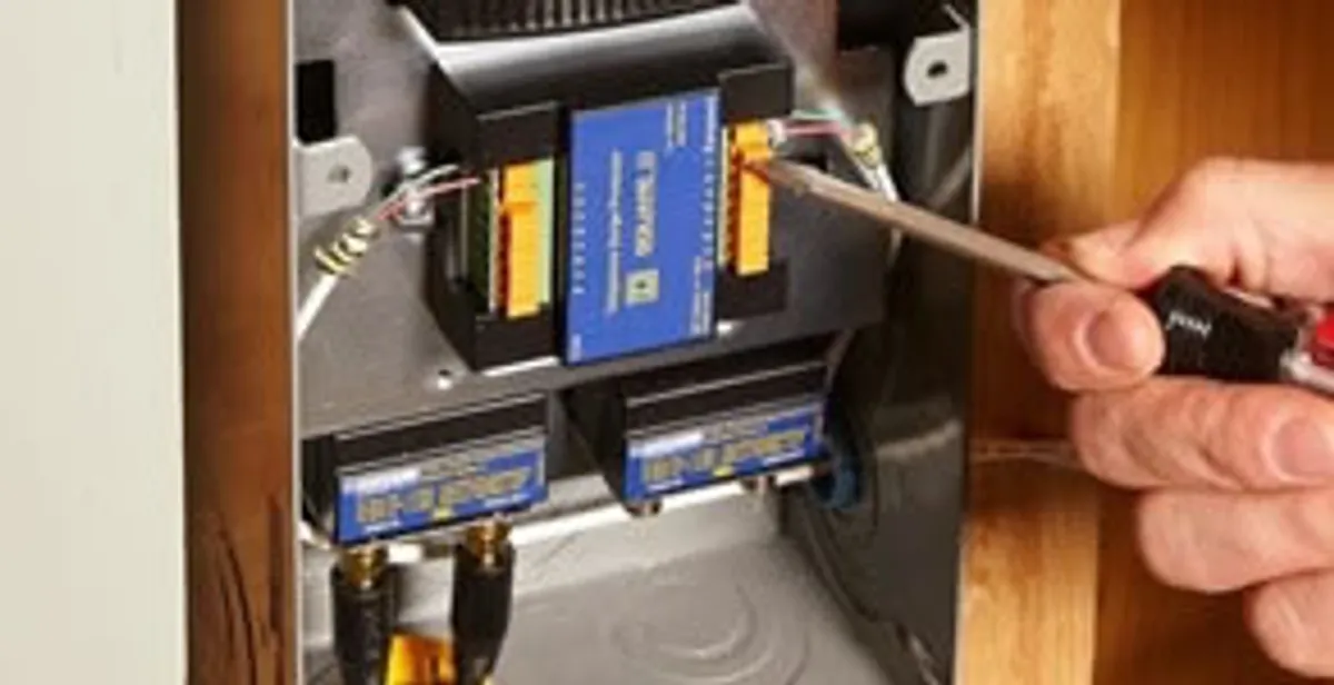 Whole home surge protection device being installed by a licensed electrician to protect electrical systems in Dallas, TX